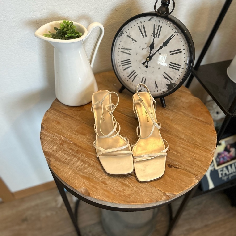 Strappy  Bandolino size 7 1/2 cream colored block heels